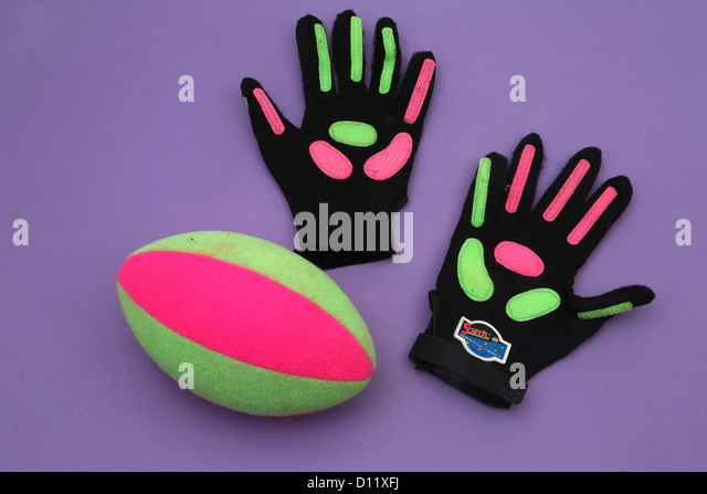 gloves-and-ball-from-the-game-scatch-grip-football-d11xfj.jpg